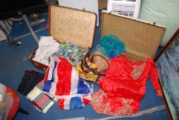 Suitcases with scarves, Union Jack flag, etc.