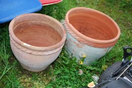 Two terracotta planters.