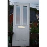 A door with letter box, 78'' x 30''.