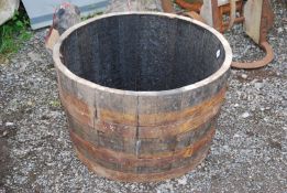 A half whisky barrel,