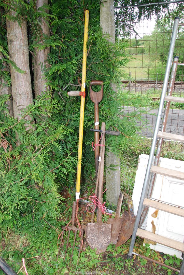 A quantity of garden tools.