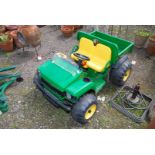 **A child's "John Deere Gator" Electric Buggy (battery in office). Sold As Seen.