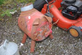 A garden incinerator in the shape of a pig.