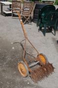 An old hand disc cultivator.