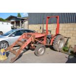 A Massey Ferguson 135 diesel-engined Farm Tractor with fore-end loader and bucket and having the