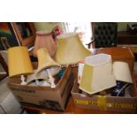 Two boxes of table lamps and shades.