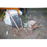 A log splitter, axe, bucket of heavy duty ball and jaw towing bar, wire rope, spark guard,