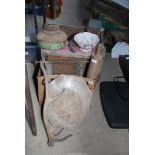 A box containing oil store, carriage lamp, old drawers, antler and rolling pin.