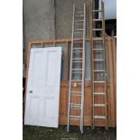A double extension eleven rung ladder with pulley action.