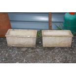 Two concrete planters with deer decoration, 22 1/2'' x 11'' x 10'' high.