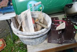 A bucket of floats, masonry chisel, etc. plus four post supports, 75 mm.