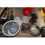 A quantity of clocks, vacuum bits, frills and chargers,