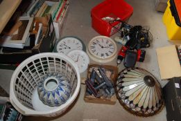 A quantity of clocks, vacuum bits, frills and chargers,