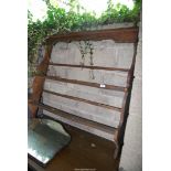 A dark wood plate rack a/f., 42" x 40" high.