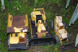 Three Tonka toys including dump truck, bulldozer and tipping truck, distressed.
