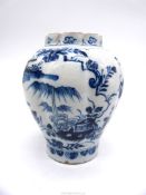 An old Oriental lobed shape blue & white vase decorated with blossoms and stylised bugs having