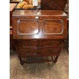 A 1920's/30's Oak Bureau of Jacobean style,