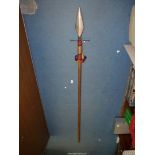 A re-enactment Spear with red and gold cord and tassel binding.