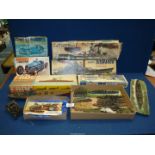 A large box of vintage plaster kits, some boxed, including tanks, battleships, Airfix etc.