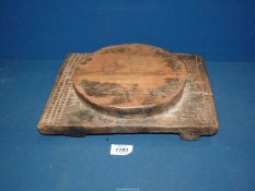 An ancient carved hardwood Pot Stand of rustic origin, 13'' x 9 1/4'' x 2 11/2'' high.