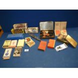 A quantity of old playing cards, Dominoes, draught pieces, lead warship, cars, etc.