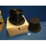Two black Top Hats, one by Tress & Co.