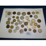 A quantity of old coinage including; half pennies, two shillings, half crown, three pence pieces,