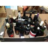 A quantity of bottles of alcohol, including Harveys, QC, Baileys,