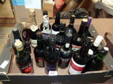 A quantity of bottles of alcohol, including Harveys, QC, Baileys,