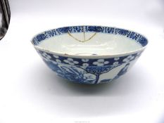 A Chinese Punch Bowl, well painted in blue with scholars,