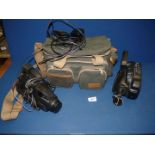 A green Miranda camera case with a Canon UC2000 8mm Video Camcorder and Chinon VC18001A video