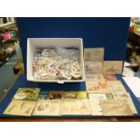 A large quantity of cigarette and tea cards both loose and in albums; wild flowers,