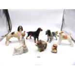 Four china dogs including Hornsea Spaniel and Box Terrier, Coopercraft Red Setter,