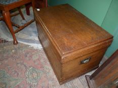 An Oak Campaign Chest with drop handles to each side,