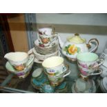 A six setting Roslyn china Tea service in 'Wheatcroft Roses' design including; teapot, sugar bowl,
