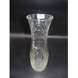 A large cut crystal vase.