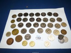Twenty seven centenary FA cup football tokens and miscellaneous foreign coins.