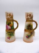 A pair of Royal Worcester porcelain jugs in shape pattern 1047, painted with pink and yellow roses,