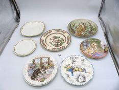 A quantity of wall plates including a Royal Worcester ''Puppy love'' and ''What's for tea',