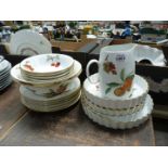A quantity of Royal Worcester Evesham to include six dessert plates, flan dishes, two fruit bowls,