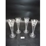 Four Royal Doulton champagne flutes having apple flower design,