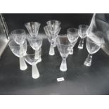 A quantity of modern wine glasses and sundae dishes, the solid stem in frosted,