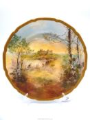 A 1920's Royal Doulton hand painted porcelain cabinet plate depicting Linlithgow Palace Scotland