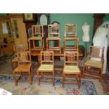 A good set of eight Robert Thompson "Mouseman" Oak lattice-back Dining Chairs including a pair of