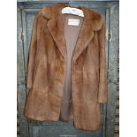 A Maxwell Croft fur jacket, light brown, size Medium.