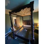 A Dark Oak four poster bedstead with pleated fabric canopy/head,
