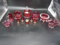 A quantity of cranberry glass including bowls, jugs, glasses etc.