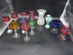 A quantity of coloured hock glasses including Waterford, etc.