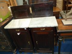 A mirrored pair of dark Oak Campaign style Bedside Cabinets, each having a frieze drawer,