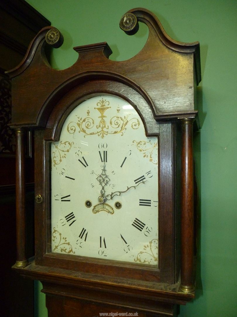 A cross-banded Oak cased Longcase Clock having a painted face with Roman hour numerals and Arabic - Image 3 of 8